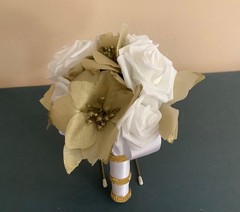 Gold poinsettia and rose wedding bouquet