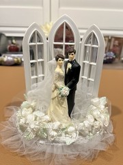 Wilton «Dedication» Wedding Cake Top, Black coat, black pants.