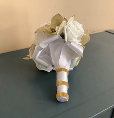 Gold poinsettia and rose wedding bouquet