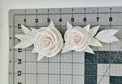 Handcrafted foam flowers for wedding invitation boxes and cards