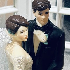 Wilton «Dedication» Wedding Cake Top, Black coat, black pants.