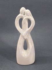 Studio His & Hers 7.5″ Ceramic Cake Topper Man & Woman Holding Each Other Heart
