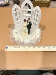 Wilton «Dedication» Wedding Cake Top, Black coat, black pants.