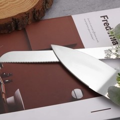 Elegant Silver Serrated Wedding Cake Knife and Serving Shovel with Green Leaf