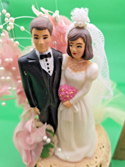 Stamped Vintage 1986 wedding/Anniversary Bride and groom cake topper. Plastic.