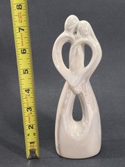 Studio His & Hers 7.5″ Ceramic Cake Topper Man & Woman Holding Each Other Heart