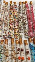 Chocolate/ White Chocolate Coated Pretzel Rods Assorted 16 CT Assorted Toppings