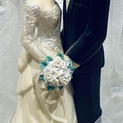 Wilton «Dedication» Wedding Cake Top, Black coat, black pants.