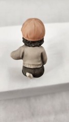 2000 NBM Bahner Studios Enesco Boy Smelling Tulips Figurine #678201