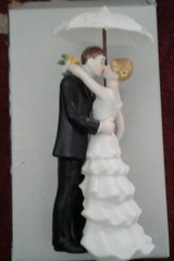 WEDDINGSTAR CAKE TOPPER~SHOWERED WITH LOVE COUPLE. NIB. HANDPAINTED BISQUE