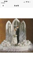 Wilton «Dedication» Wedding Cake Top, Black coat, black pants.