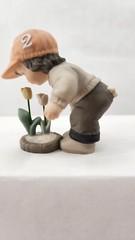 2000 NBM Bahner Studios Enesco Boy Smelling Tulips Figurine #678201