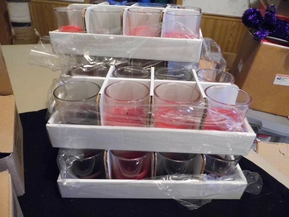 52 Clear Votive Candles Used but no chips or cracks.