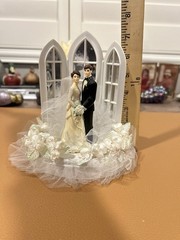 Wilton «Dedication» Wedding Cake Top, Black coat, black pants.