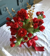 Red rosebuds, red blooms, gold eucalyptus and gold crystals bridal bouquet
