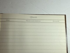 Beautiful guest book with wood vinyl wood print cover “guests” In gold cursive.
