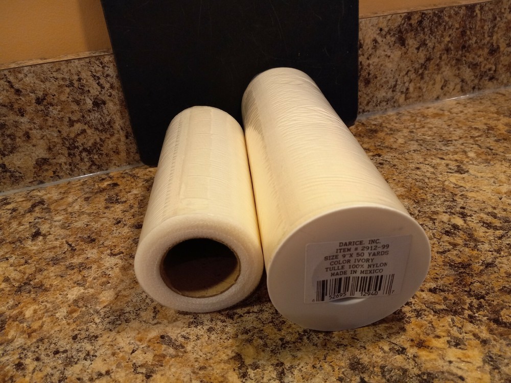 2 Spools Darice Tulle Size: 9″ x 50 Yards Size: 6″ x 30+ Yards 100% Nylon Ivory