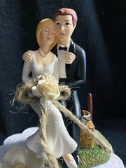 Country Western Wedding cake topper Bribe & Groom Figurine top. Hay barn yard