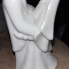 white porcelain bride/groom wedding cake topper
