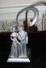 MID CENTURY PEWTER BRIDGE GROOM FIGURINE W MESSAGE HOOK