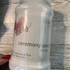 his and hers wedding white ceremony sand