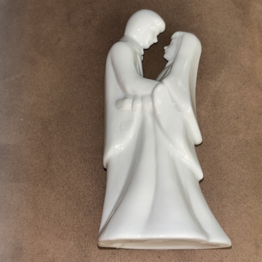 white porcelain bride/groom wedding cake topper