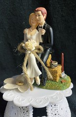 Country Western Wedding cake topper Bribe & Groom Figurine top. Hay barn yard