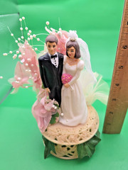 Stamped Vintage 1986 wedding/Anniversary Bride and groom cake topper. Plastic.