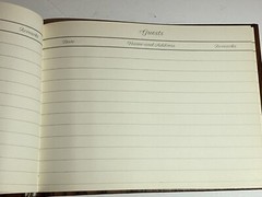 Beautiful guest book with wood vinyl wood print cover “guests” In gold cursive.