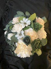 Hunter Green, Ivory and some white. Bridal bouquet with matching boutonnière.