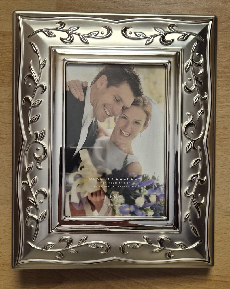 Lenox Opal Innocence Photo Album holds 5 x 7 and 4 x 6 photo.