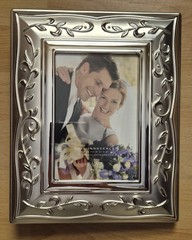 Lenox Opal Innocence Photo Album holds 5 x 7 and 4 x 6 photo.