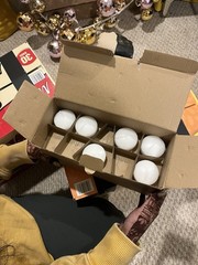 Bulk floating votive candles and holders