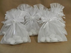 50 Set exquisite pouches hand-made Italian favors for $ 75.00