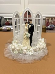 Wilton «Dedication» Wedding Cake Top, Black coat, black pants.