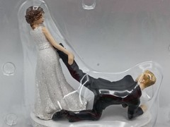 Humorous Leg-Pulling Bride With Groom Resin Wedding Cake Topper