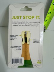 True Fizz: Gold Champagne Stopper with MUMM logo
