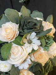 Hunter Green, Ivory and some white. Bridal bouquet with matching boutonnière.