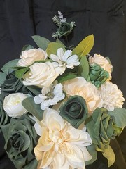 Hunter Green, Ivory and some white. Bridal bouquet with matching boutonnière.