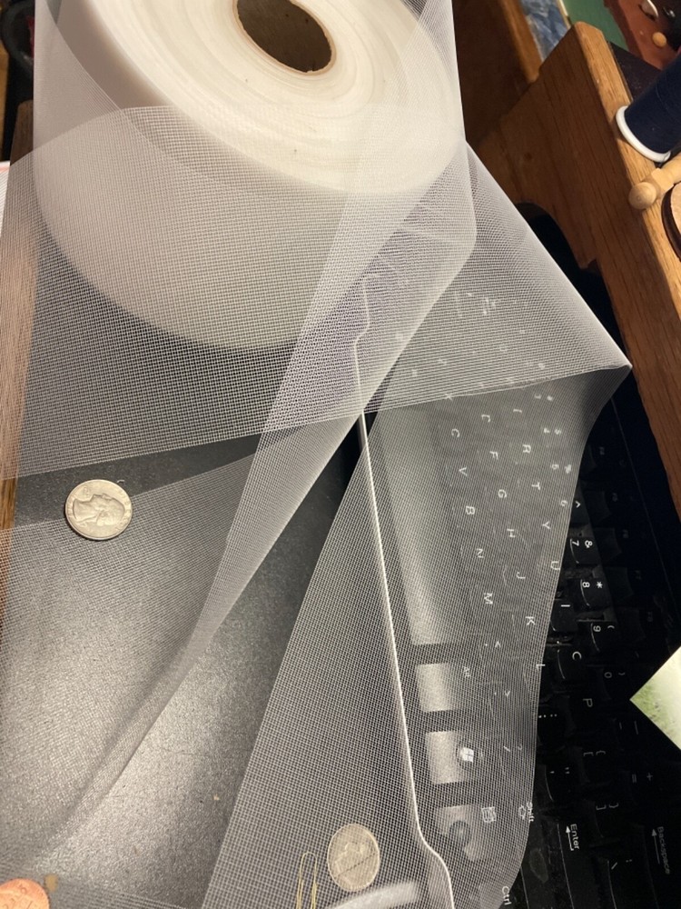 4 inch wide off white tulle (net), 2 yards