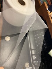 4 inch wide off white tulle (net), 2 yards