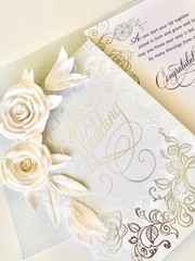 Handcrafted foam flowers for wedding invitation boxes and cards