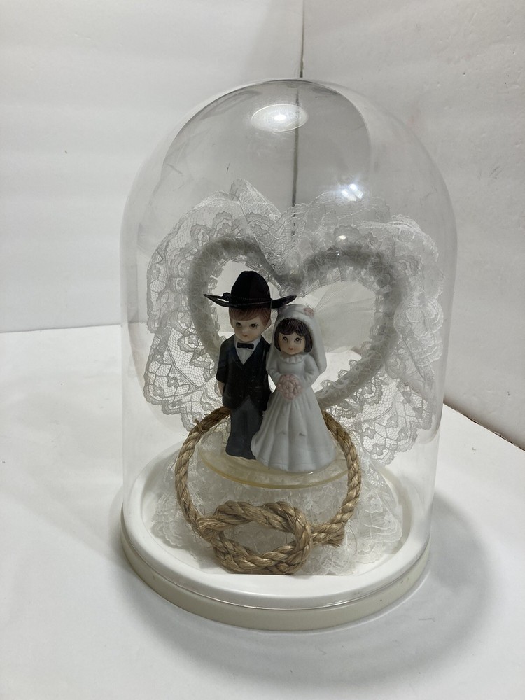western style wedding cake topper ceramic figures in dome