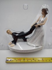 Humorous Leg-Pulling Bride With Groom Resin Wedding Cake Topper