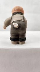 2000 NBM Bahner Studios Enesco Boy Smelling Tulips Figurine #678201