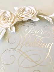 Handcrafted foam flowers for wedding invitation boxes and cards