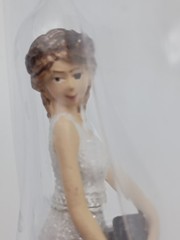 Humorous Leg-Pulling Bride With Groom Resin Wedding Cake Topper