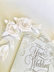 Handcrafted foam flowers for wedding invitation boxes and cards