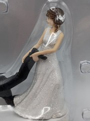 Humorous Leg-Pulling Bride With Groom Resin Wedding Cake Topper