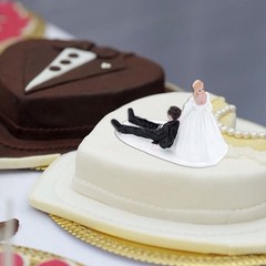 Funny Black and White Bride Dragging Groom Wedding Cake Topper Figurine
